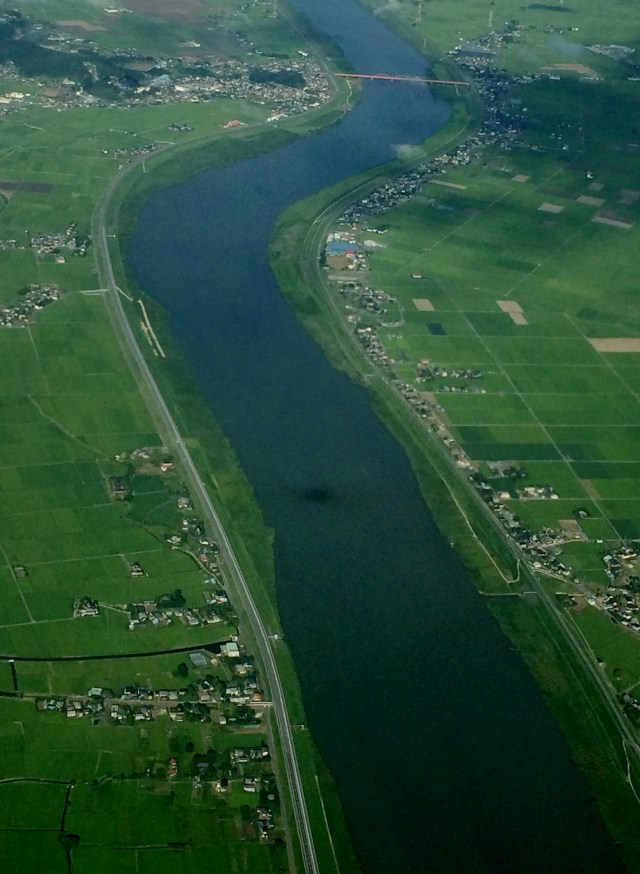 Along the river; river banks should empty from building
